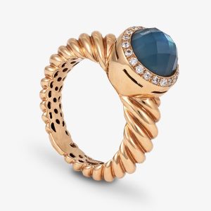 Anillo de Oro Rosa con Topacio Azul tallado y brillantes en orla.Ref:155-1AN0031989